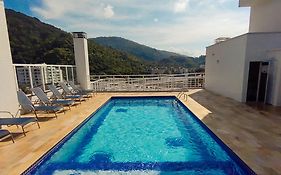 Apartamentos 300m Praia das Toninhas - vista para a serra do mar